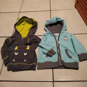 Bundle of baby sweaters and pants